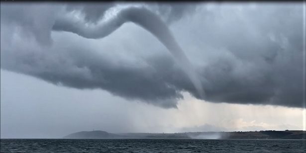 The tornado-like phenomena appeared amid the ever-changing weather