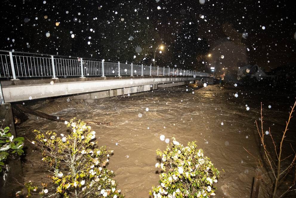 Click to enlarge Flood waters are rising in central Nelson. Pictured is the Bridge St bridge and swollen Maitai River.