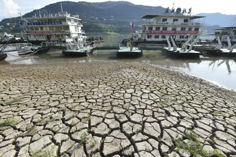 A dried riverbed is exposed on Tuesday after the water level dropped in the Yangtze River in southwest China.