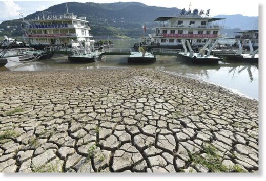 A dried riverbed is exposed on Tuesday after the water level dropped in the Yangtze River in southwest China.