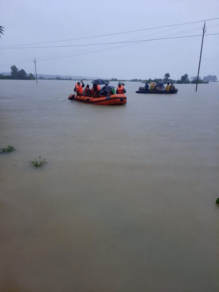 Click to enlarge Flood rescues in Athamallick area of Angul district