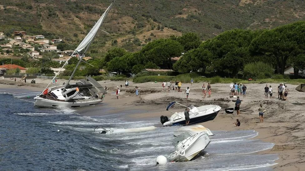 Click to enlarge Boats were thrown onto the beach of Sagone in Coggia, Corsica