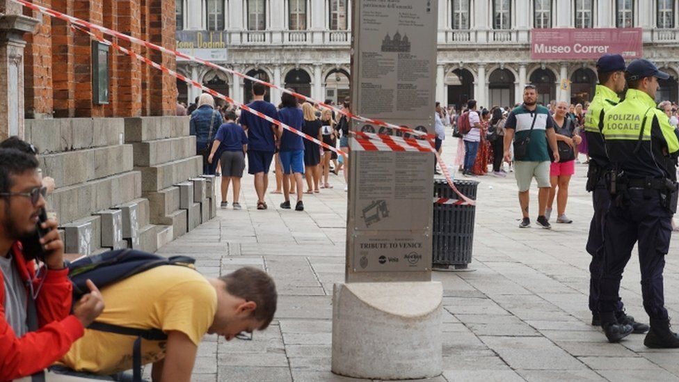 Click to enlarge Parts of Venice's St Mark's Square were cordoned off after the storm