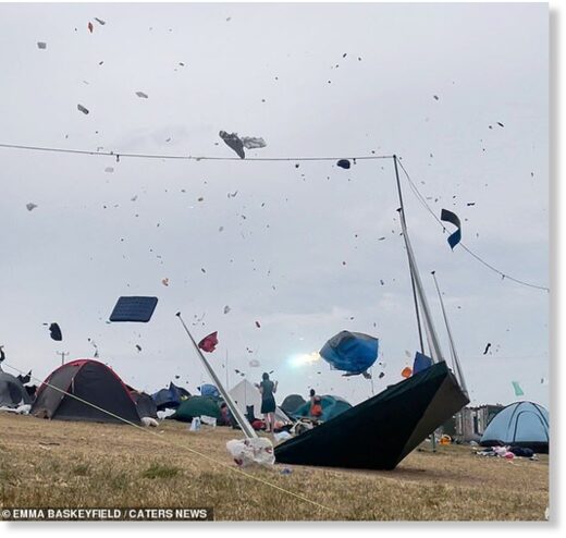 A festival-goer has captured the dramatic moment a mini tornado hit a festival, with the strong winds wreaking havoc across the campsite after a week of scorching temperatures