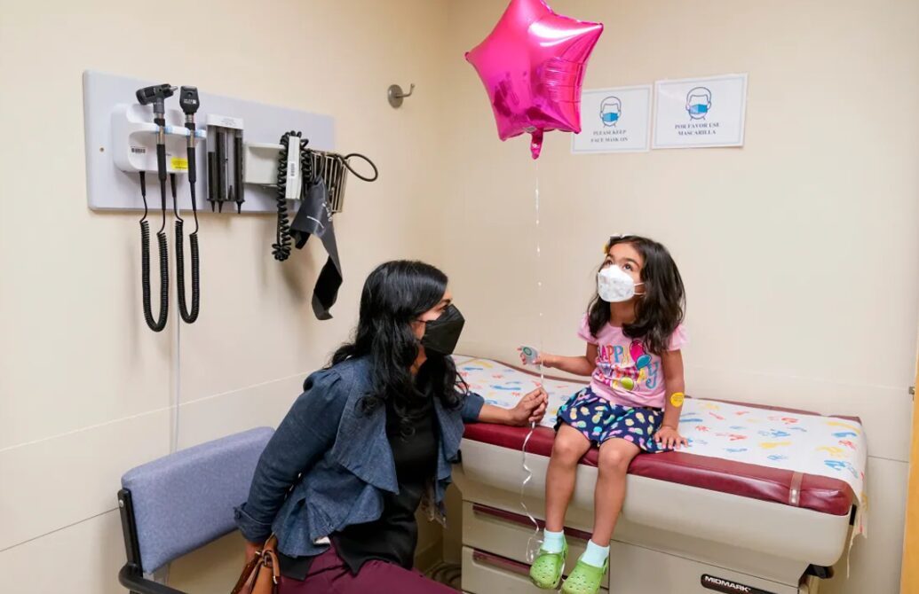 child doctors office mask balloon vaccine