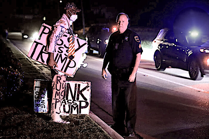 Click to enlarge Officer and Trump hater