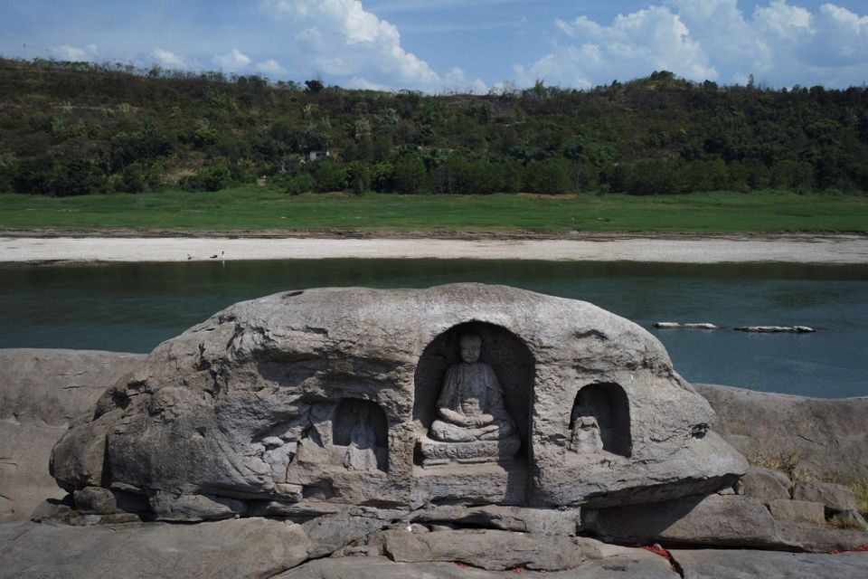 Click to enlarge drought china buddhist statues river