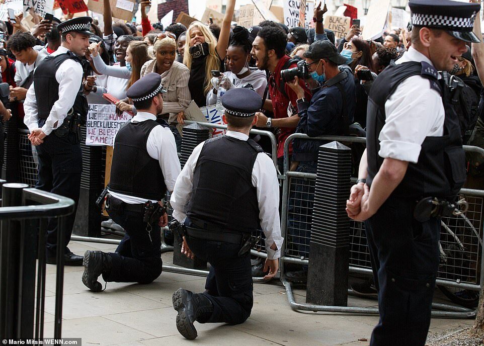 Uk cops take knee woke