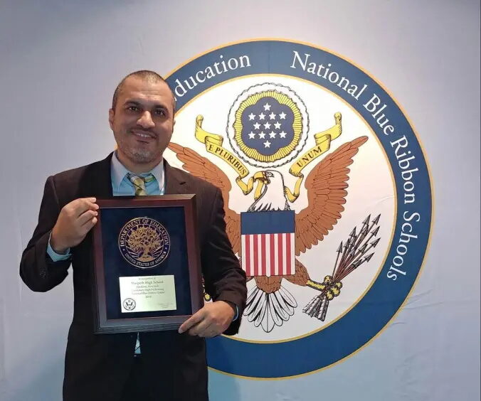 Click to enlarge Maspeth HS principal Khurshid Abdul-Mutakabbir