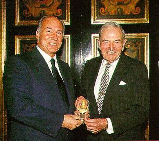 Khan  Rockefellers and the Rothschilds.