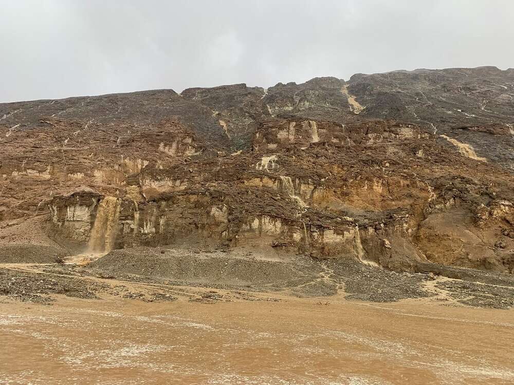Click to enlarge On Saturday, Sept. 10, a park ranger took this photo of waterfalls in normally-dry Death Valley National Park. Badwater Road, south of Natural Bridge.