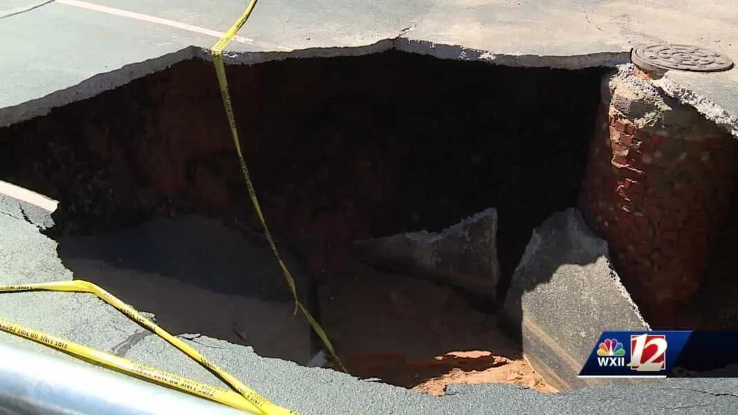 According to a fire official, the hole was roughly 15 feet wide and 8 feet deep.