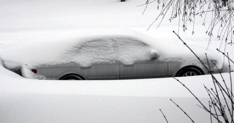 snow covered car