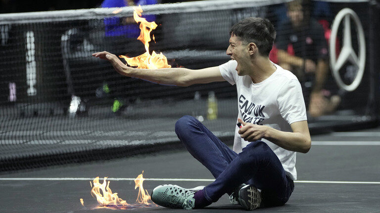 protester fire tennis