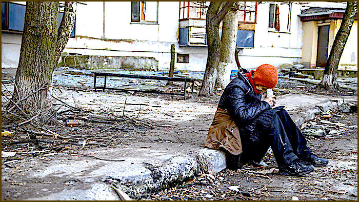 woman sitting curb