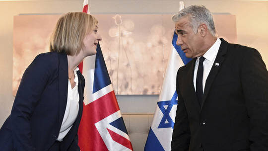 Click to enlarge Liz Truss and Yair Lapid