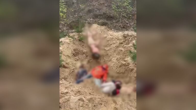 Click to enlarge Ukraine mass grave