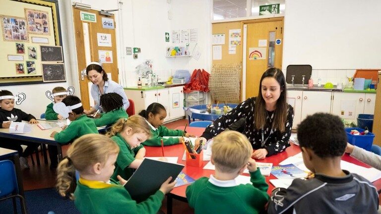 teachers teaching young students