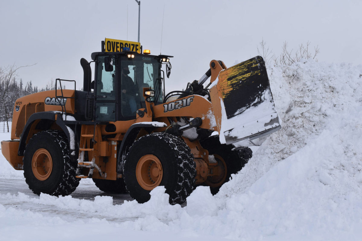 Click to enlarge Snow is cleared from a parking lot at the Kenai Municipal Airport on Wednesday, Nov. 2, 2022, in Kenai, Alaska.