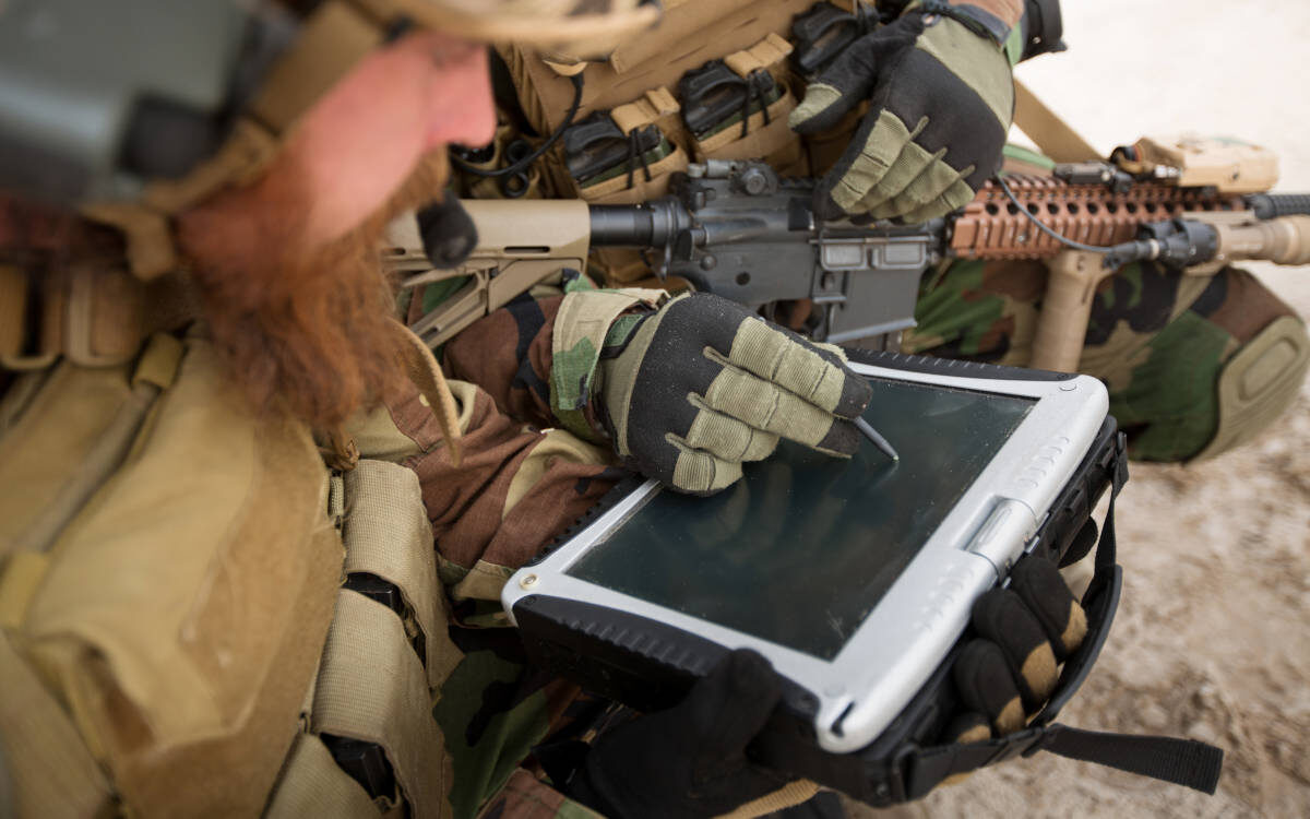 soldiers computer tablets field battle