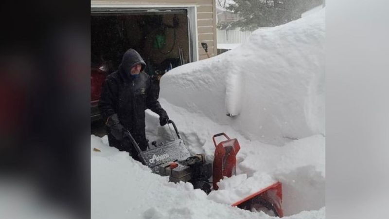 Tisdale resident Doug Tkachuk digs his cars out of the snow after the area received about 25cm of snow overnight on Saturday.