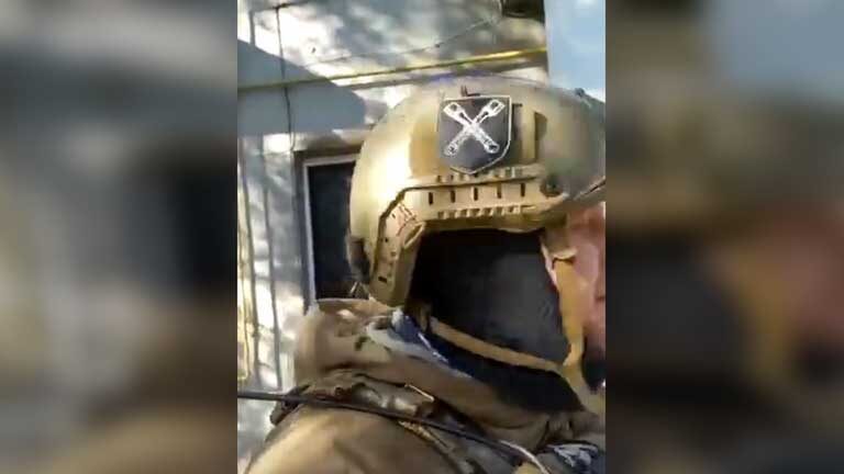 Click to enlarge Ukrainian soldier with Nazi insignia