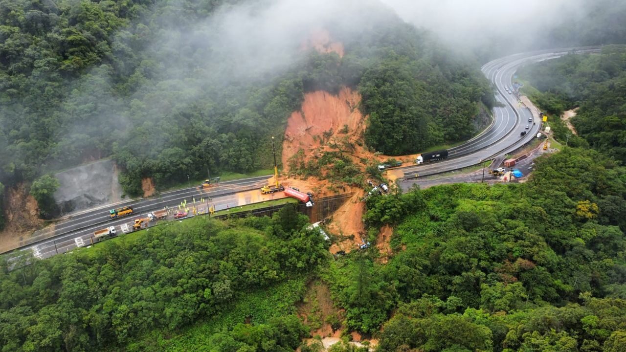 Click to enlarge Authorities believe mud buried six trailers, and up to 15 vehicles on the highway