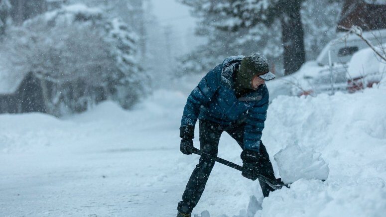 Shoveling out: Snow was still falling on Monday, Dec. 5 with more in the forecast for December's second weekend.
