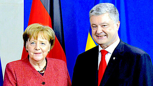Merkel admits Minsk peace accords were instead signed 'to give Ukraine' cover to prepare for conflict with Russia