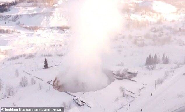 An enormous 100ft-wide 'Gate to Hell' sinkhole has opened at the Sheregesh mine in Sibera's Kemerovo region
