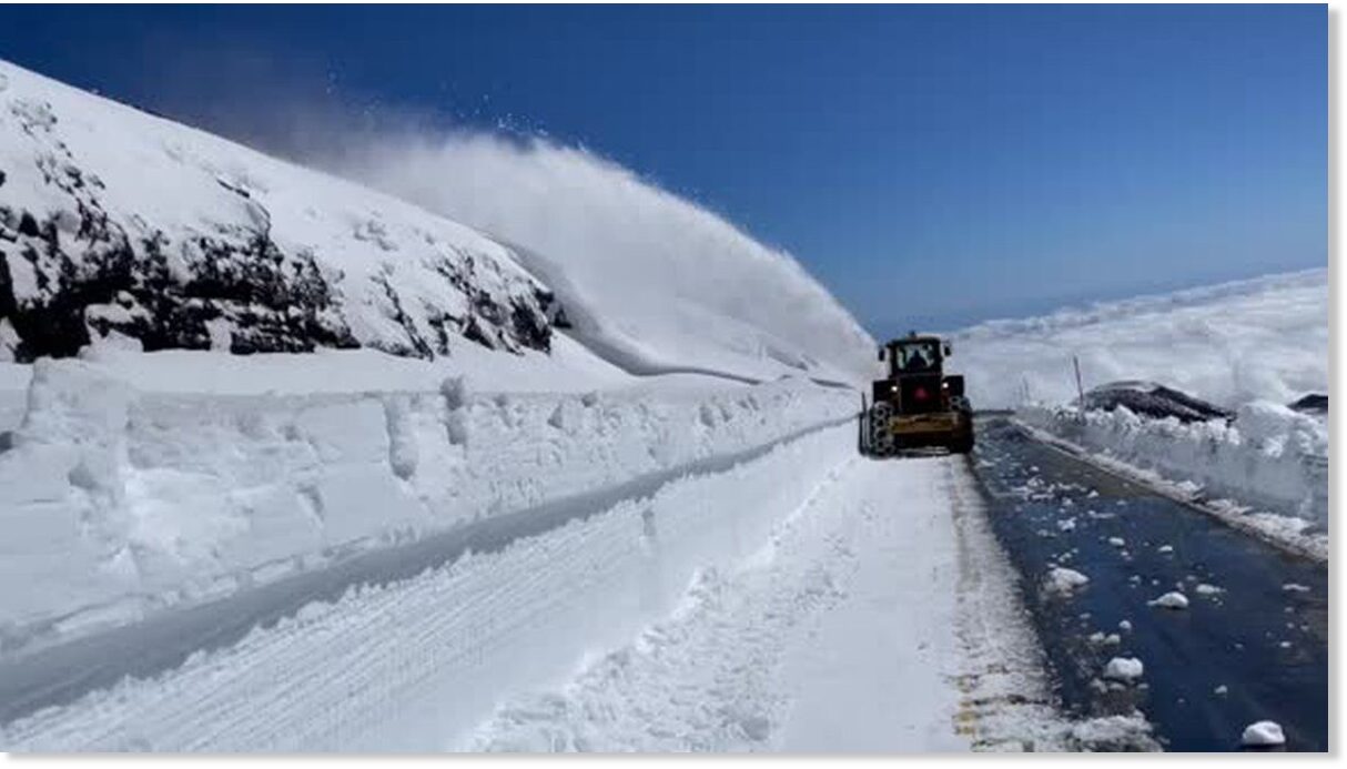 After winter storm, crews clear snow drifts up to 10 FEET high from