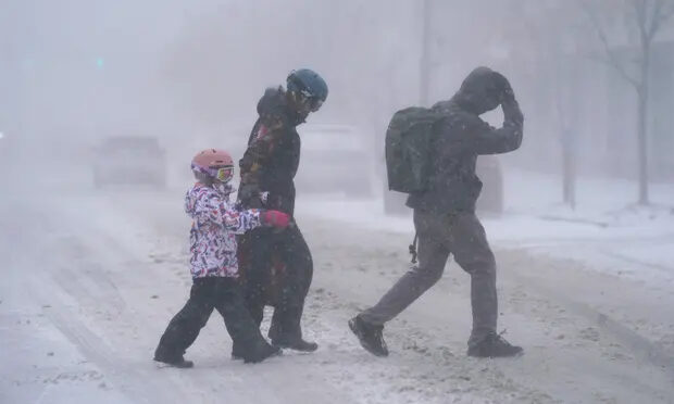 Click to enlarge Pedestrians in Buffalo, New York in 2022 winter