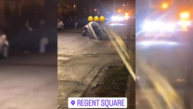 A vehicle fell into a sinkhole along Biddle Avenue in Wilkinsburg.
