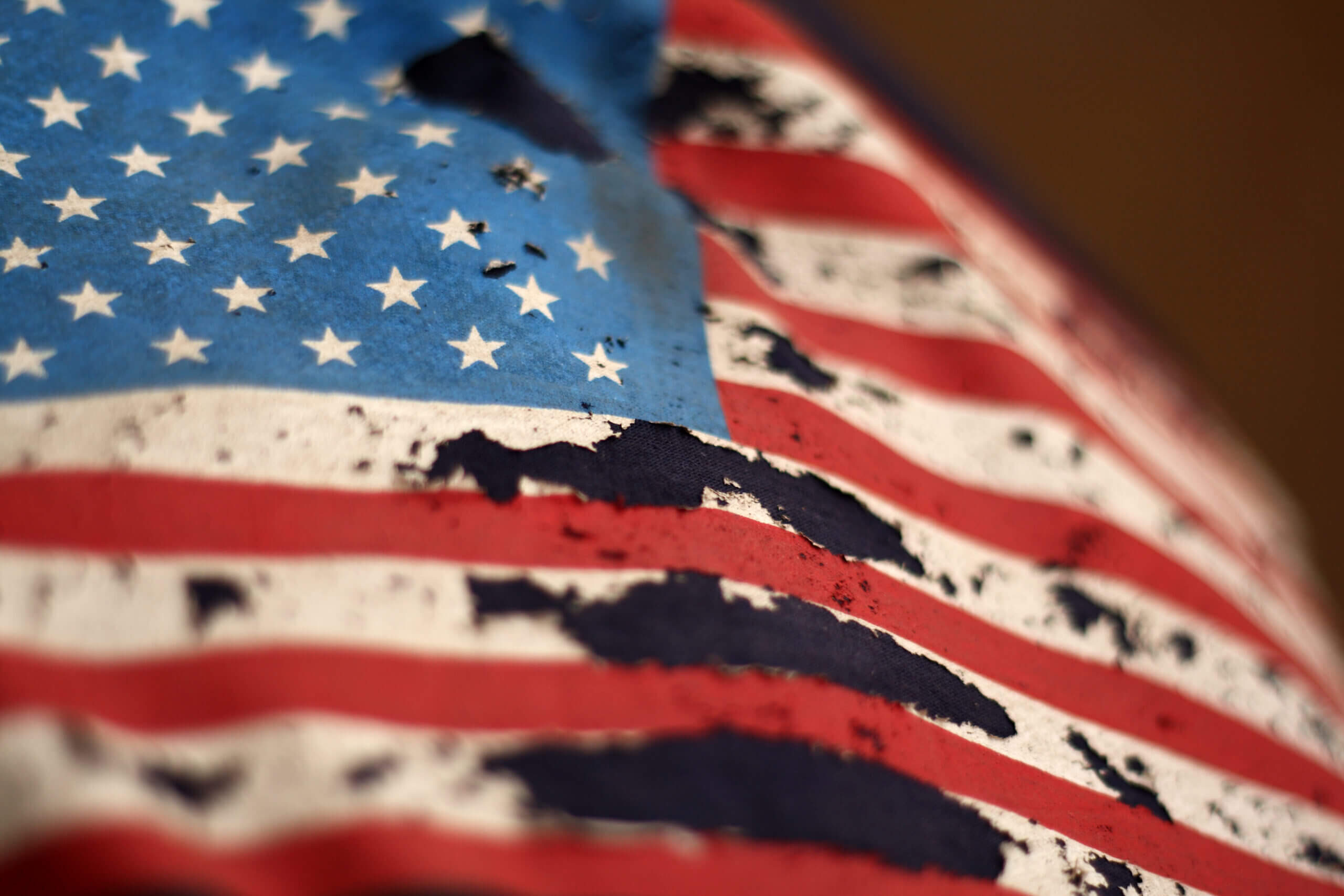 american flag torn coup