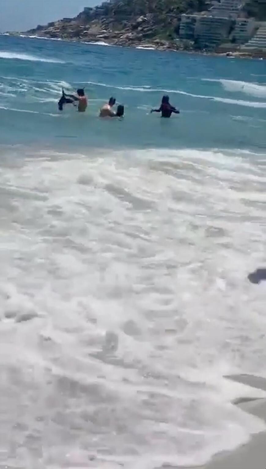 Bystanders rush to Taylor’s rescue.