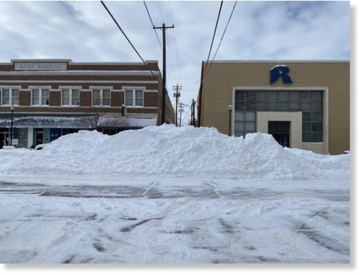 Click to enlarge Snow piles in Rawlins, Wyo.