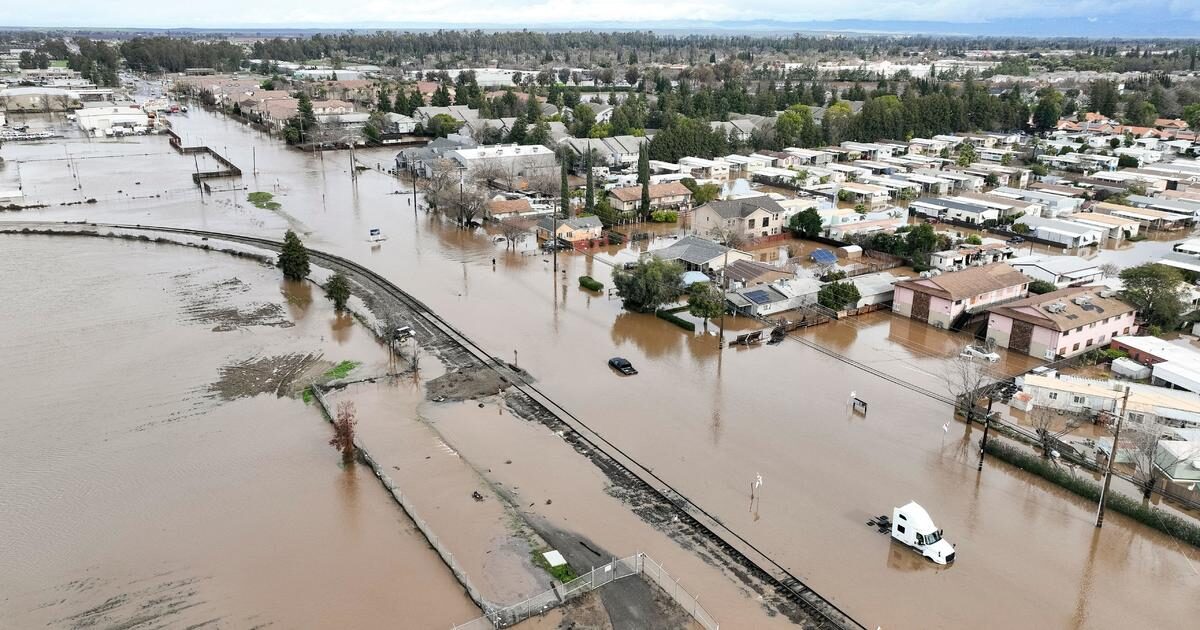 This aerial view shows a flooded neighborhood in Merced, California on January 10, 2023.