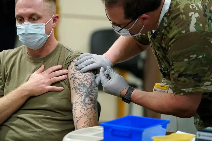 Click to enlarge soldier vaccinated