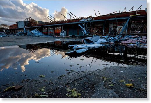 The roof of a local business is strewn about after a tornado passed through Selma, Alabama.