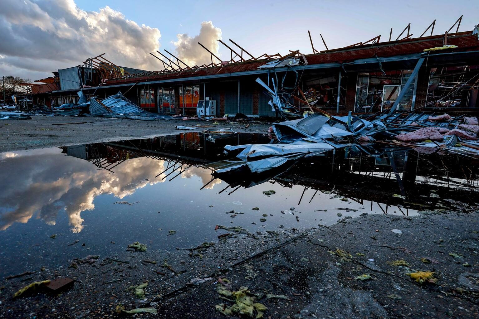 Click to enlarge The roof of a local business is strewn about after a tornado passed through Selma, Alabama.