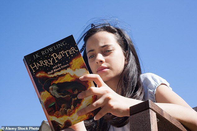 girl read harry potter book woke