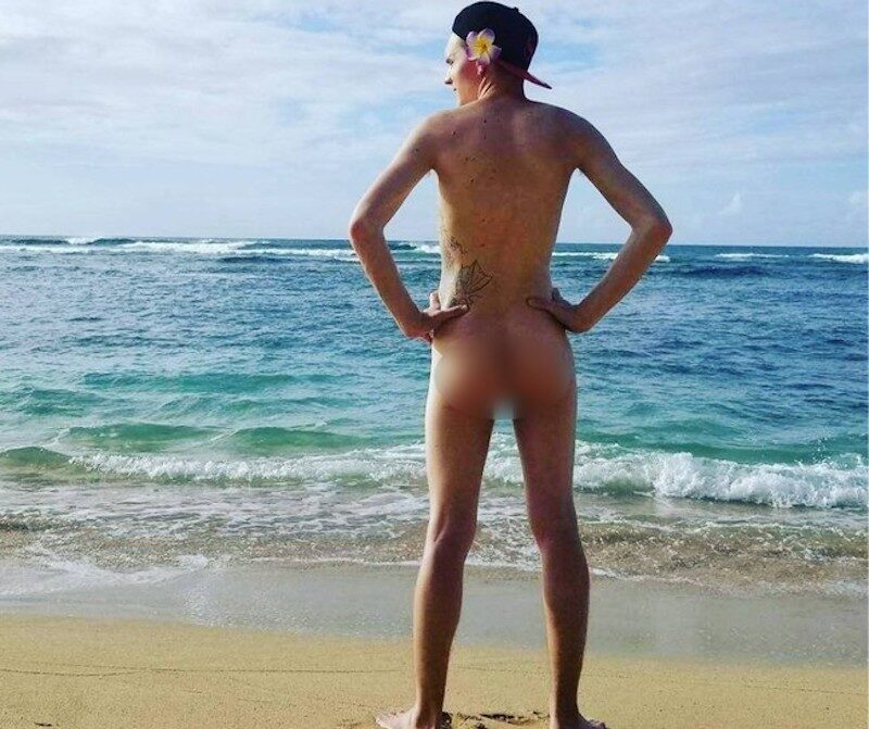 Click to enlarge William Zulock naked on the beach