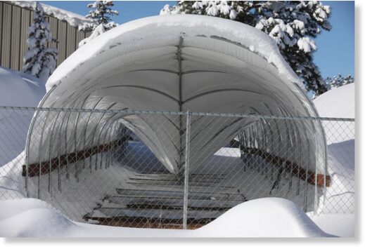 Click to enlarge A collapsed hoop house at the U.S. Geological