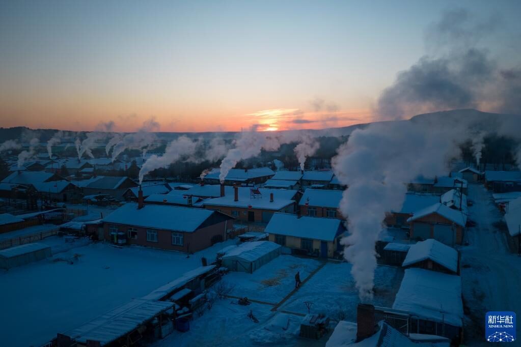This aerial photo taken on Jan 8, 2023 shows an early morning view of Beiji village in Mohe, Northeast China's Heilongjiang province.