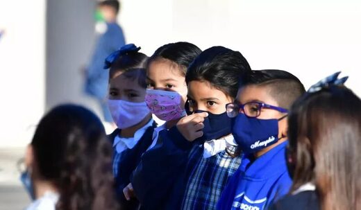 Click to enlarge students with facemask
