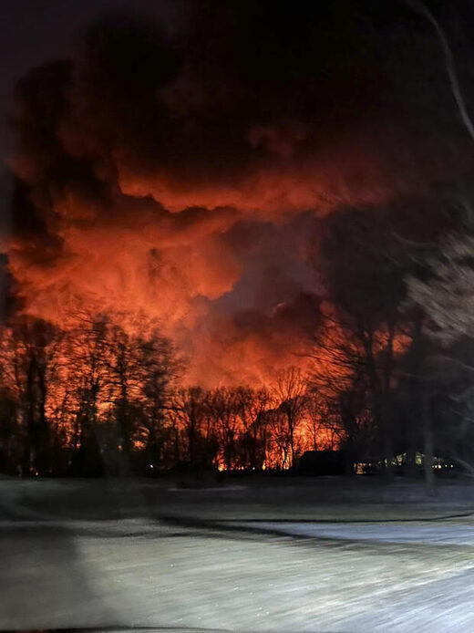 Click to enlarge Train fire is seen from her farm in East Palestine, Ohio, Friday, Feb. 3, 2023.