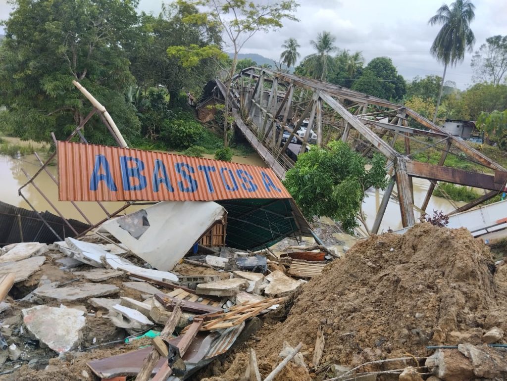Click to enlarge A landslide destroyed a bridge in Onia,