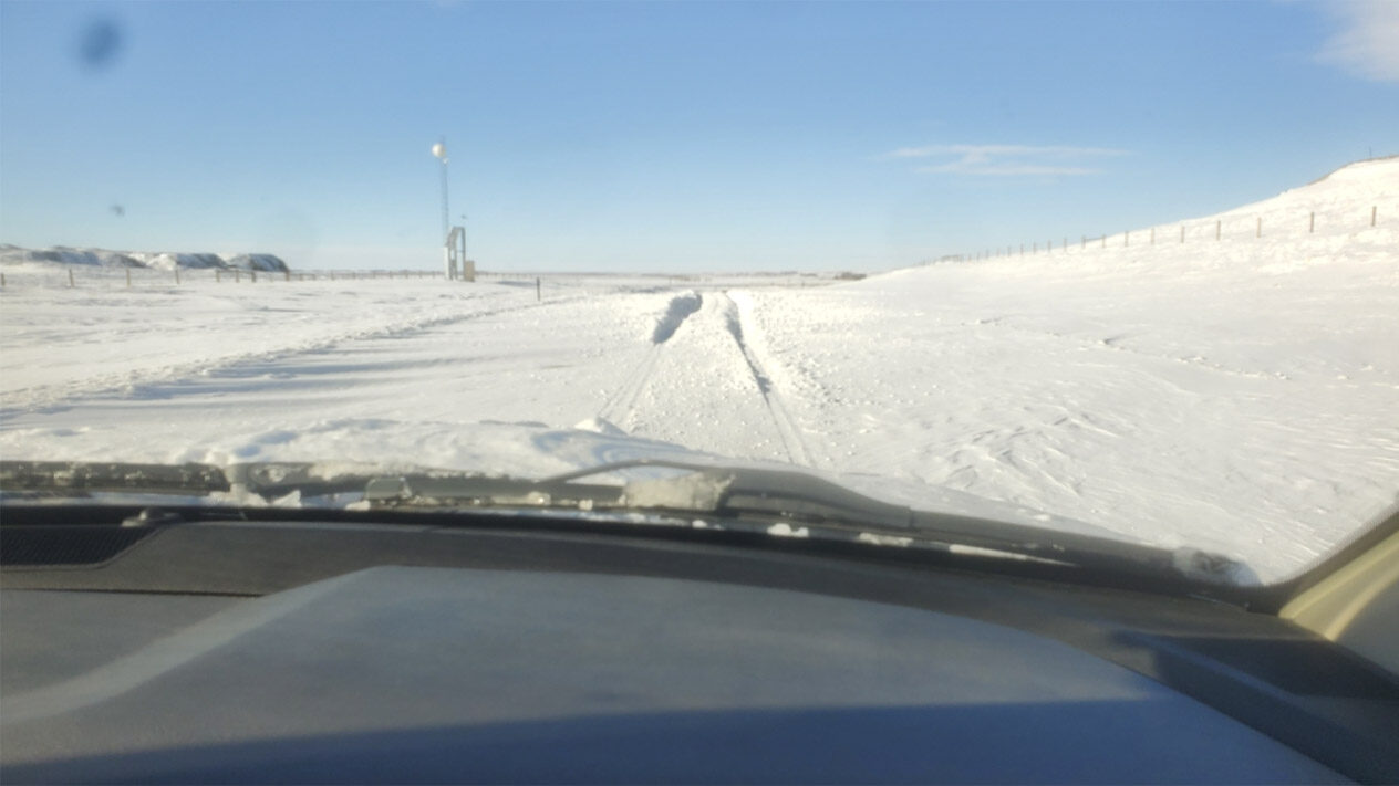 Click to enlarge Snow drift currently blocking WY28 north