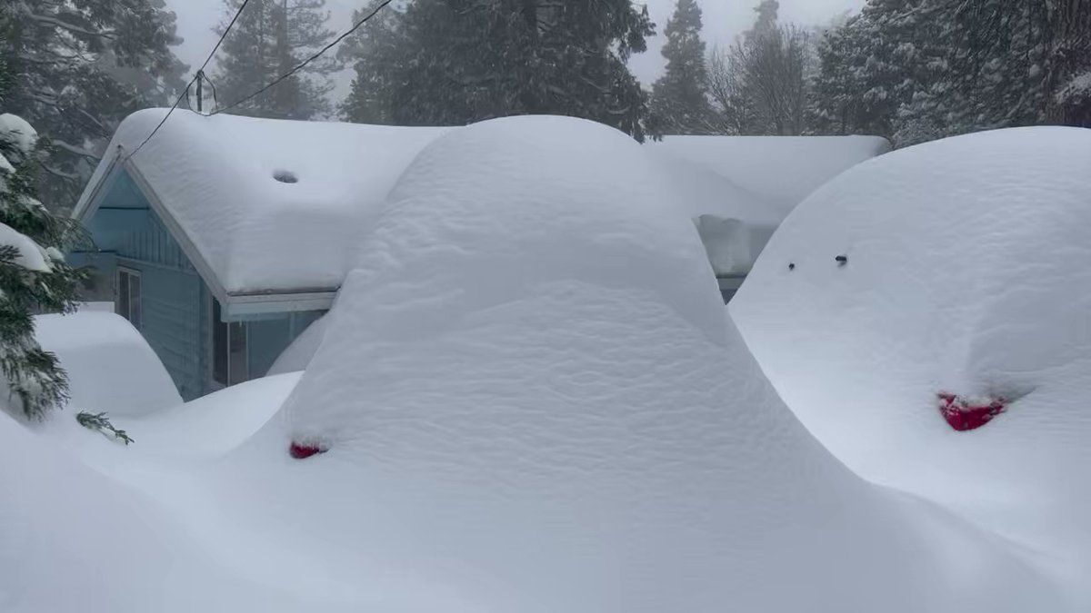 Crestline, California, inspected the heavy snowfall