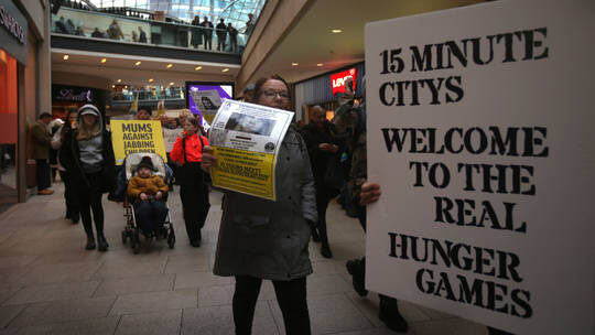 Click to enlarge Protesters against 15-minute cities